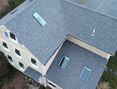 View of completed roof replacement in Medway MA using Estate Gray shingles