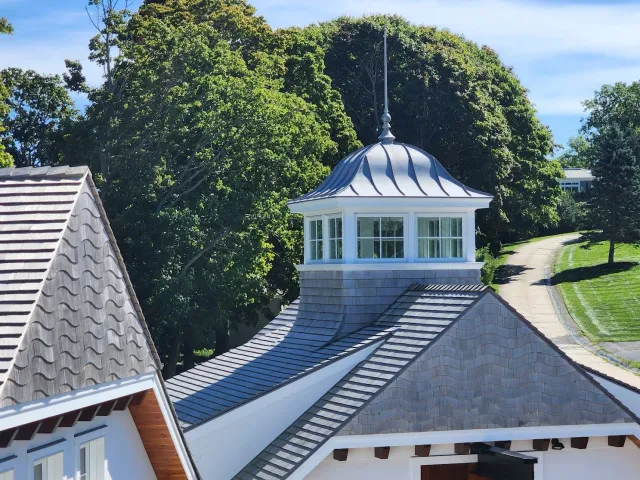 Wood siding and roofing, copper guttering and finial by Slate and Copper Services in Portsmouth, Rhode Island and Easton, Connecticut, serving Fairfield County, Providence, coastal RI, and South Coast, MA.