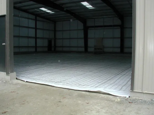 The inside of a building with a concrete floor