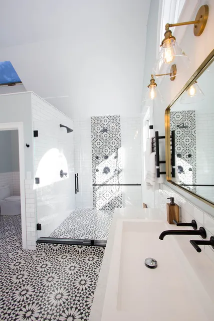 Patterned tile bathroom floor and shower
