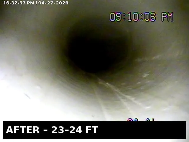 AFTER — 23-24 ft: same section of pipe, fully cleared with our root-cutting hydro jetter. Smooth walls, full diameter restored, and video-verified.