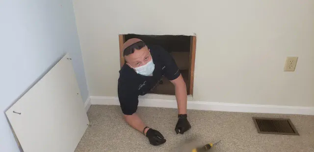 FPI home inspector performing a thorough property inspection in North Carolina