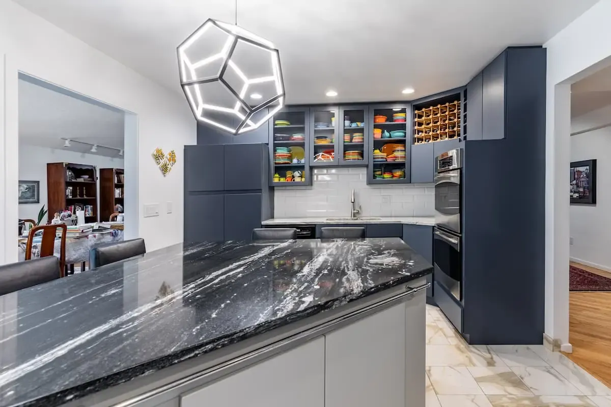 kitchen with navy blue cabinets