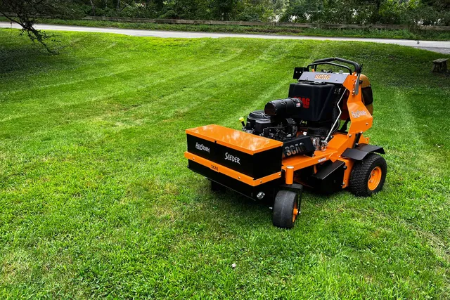 lawn dethatcher sitting on a lawn for dethatching service near me