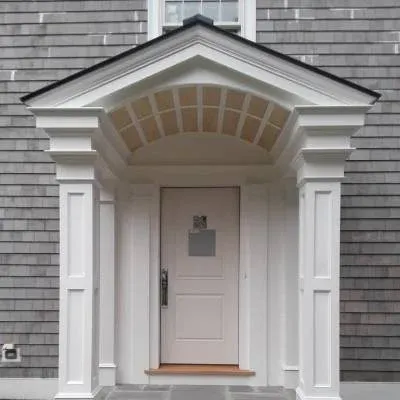 High-end portico restoration and wood rot repair featuring custom exterior trim by CLC And Sons Carpentry Co in Middleboro.