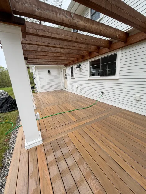 Clean wooden deck after exterior pressure washing