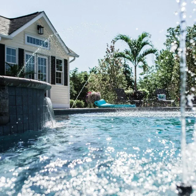 Looking for a way to escape the heat? 
You don't even have to leave your home! Jump right in to a refreshing pool! Follow that up with a cold drink while relaxing on the patio 😎

#splash #dragonfly #build #refreshing #newengland