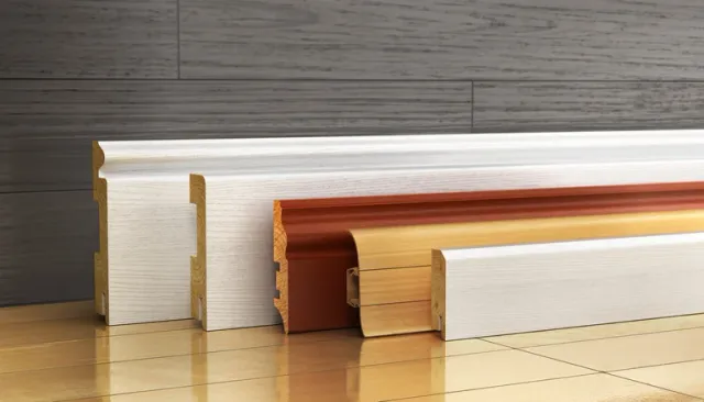 Skirting moldings on wood background