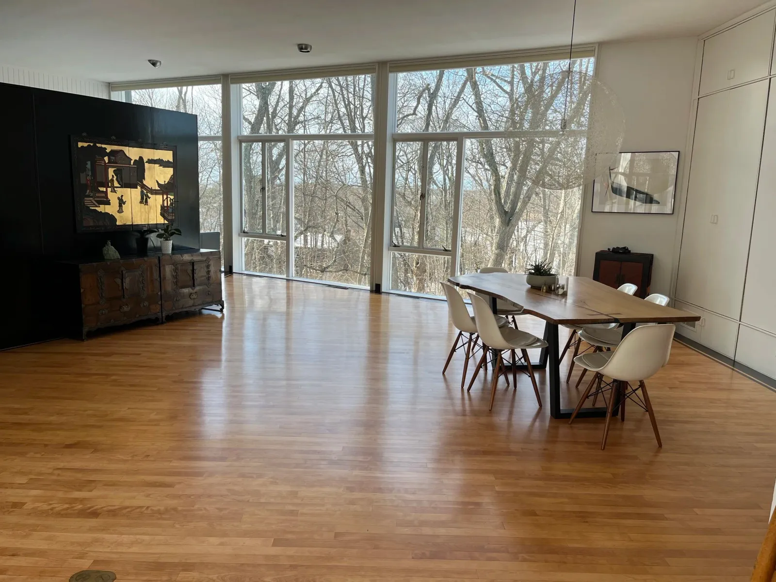 Refinished oak floor in open dining area