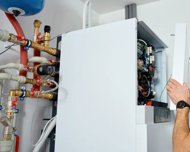brown's plumbing and heating installing boiler in manchester nh