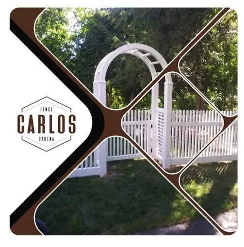 White picket fence with archway in a grassy yard. Brown frame with the words