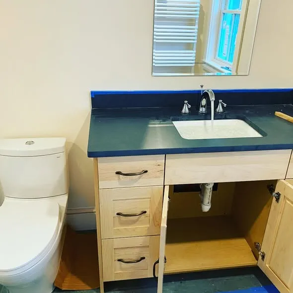 Bathroom vanity and supply connections