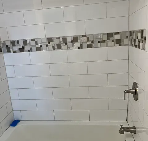 Clean bathtub in a professionally cleaned bathroom
