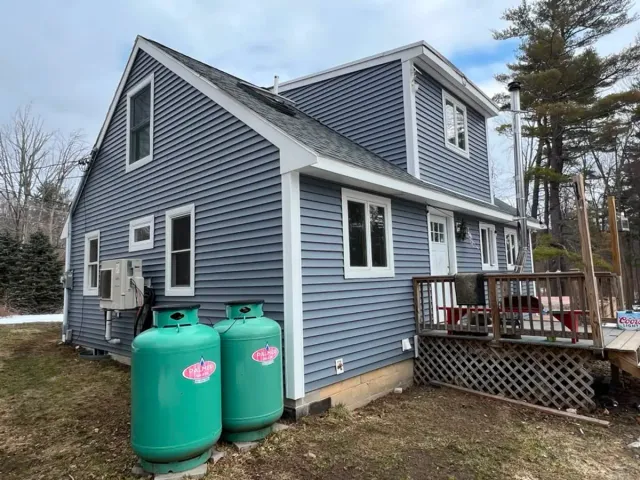 Whole-House Siding Replacement completed project in Atkinson, NH - After renovation by Maia Construction