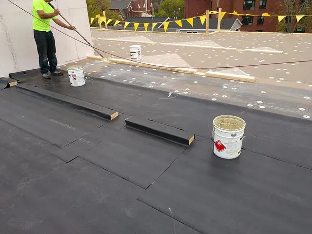 Man working on roof