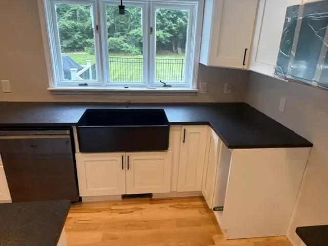 Black Pearl leathered granite kitchen countertop in a New Hampshire home