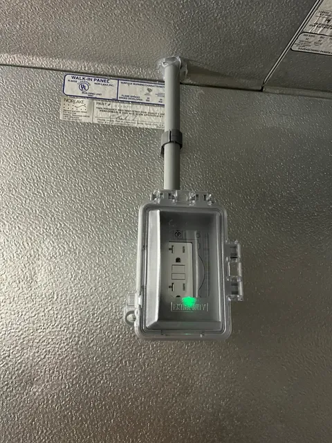 Dedicated 120V receptacle installed in walk-in cooler