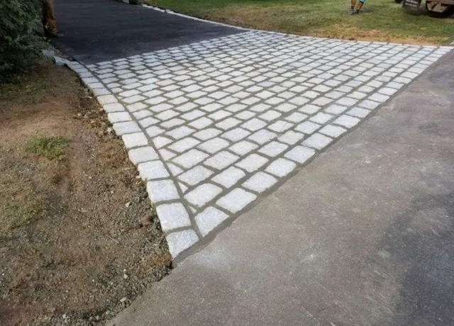 Close-up Detail of Cobblestone Paver Installation