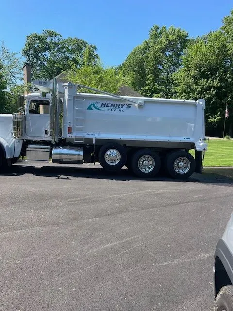 A newly paved driveway in a residential neighborhood