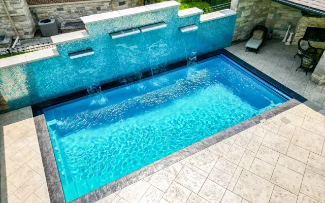 The Leisure Pools Supreme fiberglass swimming pool model