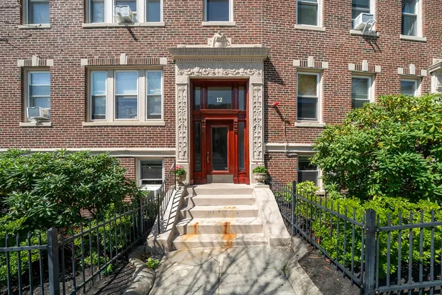 In the center of the action in vibrant Coolidge Corner, this unique condo combines a premier location with one-floor living, in a beautiful brick building on a highly coveted street. Freshly painted and in fantastic condition, this home stands out as a true gem. The gracious open floor plan offers connection between the spacious living room and dining room, while the kitchen presents a variety of tastefully arranged options for the cooking connoisseur, and newer appliances. Many windows allow light from east and west exposures. Large walk-in storage pantry, in-building laundry just a few steps outside the back door, and extra storage included. Wonderfully proportioned rooms allow flexibility for work-at-home space, while an exclusive entrance from the driveway offers privacy. Coolidge Corner shops, restaurants, grocery, movie theater, parks, the Longwood Medical area, and the T - MBTA Green Line right around the corner. Ridley School. Transferable rental parking available; condo association has a waiting list for parking in the parking area behind the building. Perfect for an owner-occupant or an investor!  ****See photos, 3D Tour, walk-through video, floor plans and more at