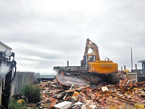 Agrillo Construction equipment removing old home and preparing the seaside house lot for new construction.