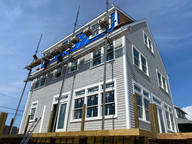 Fernandes Construction equipment seen adding a full dormer onto a roof
