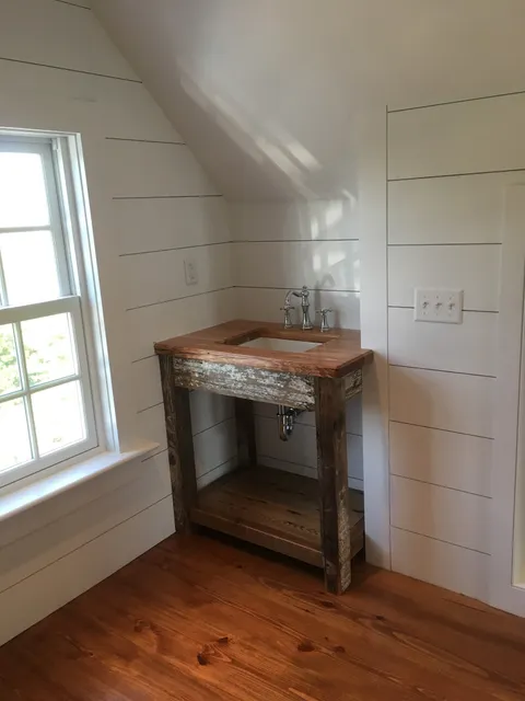 BAYSIDE PLUMBING & HEATING INC