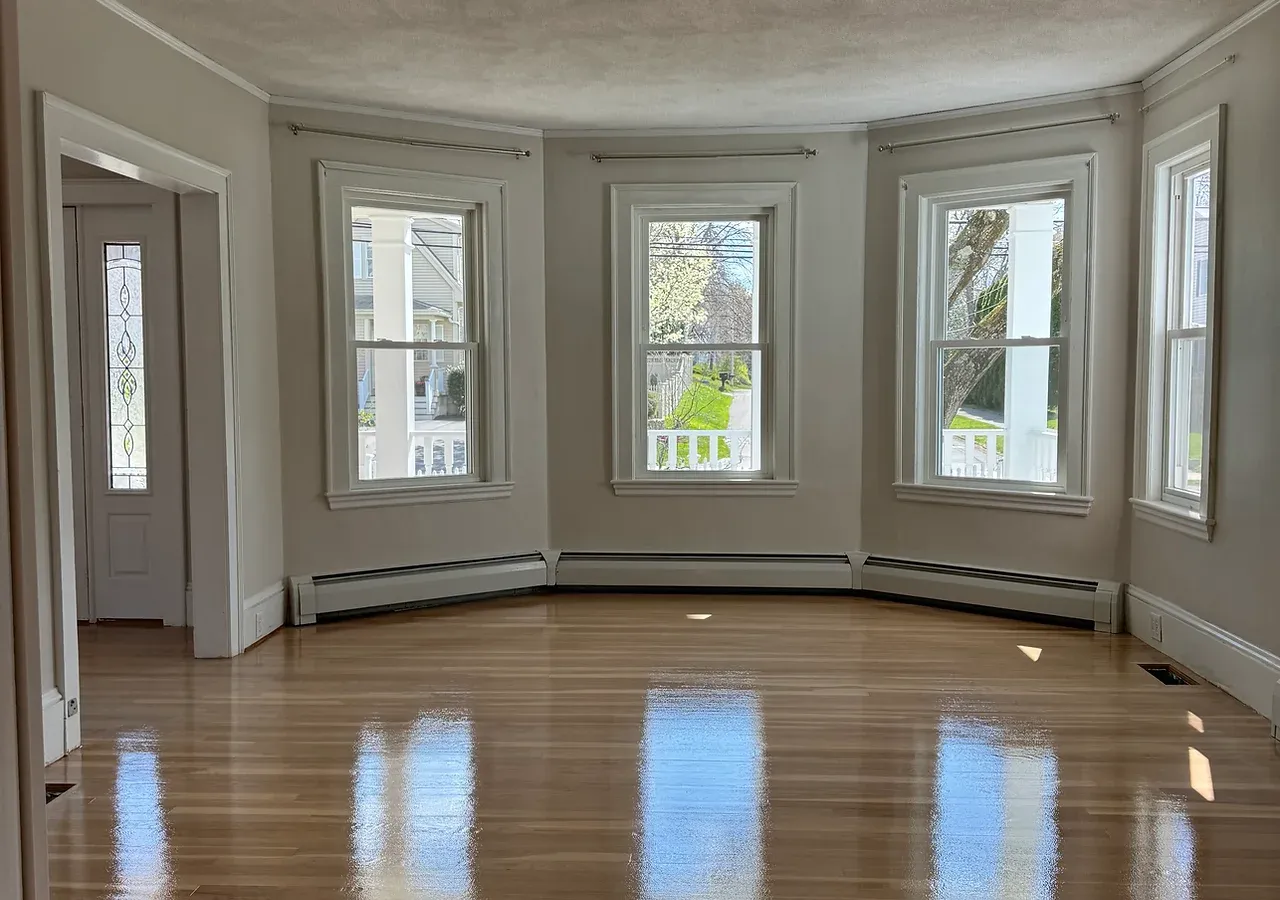 Professional hardwood floor sanding and refinishing services in Massachusetts - commercial and residential floor restoration with expert craftsmanship and quality finishes