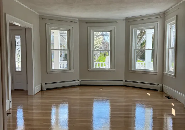 Professional hardwood floor sanding and refinishing services in Massachusetts - commercial and residential floor restoration with expert craftsmanship and quality finishes