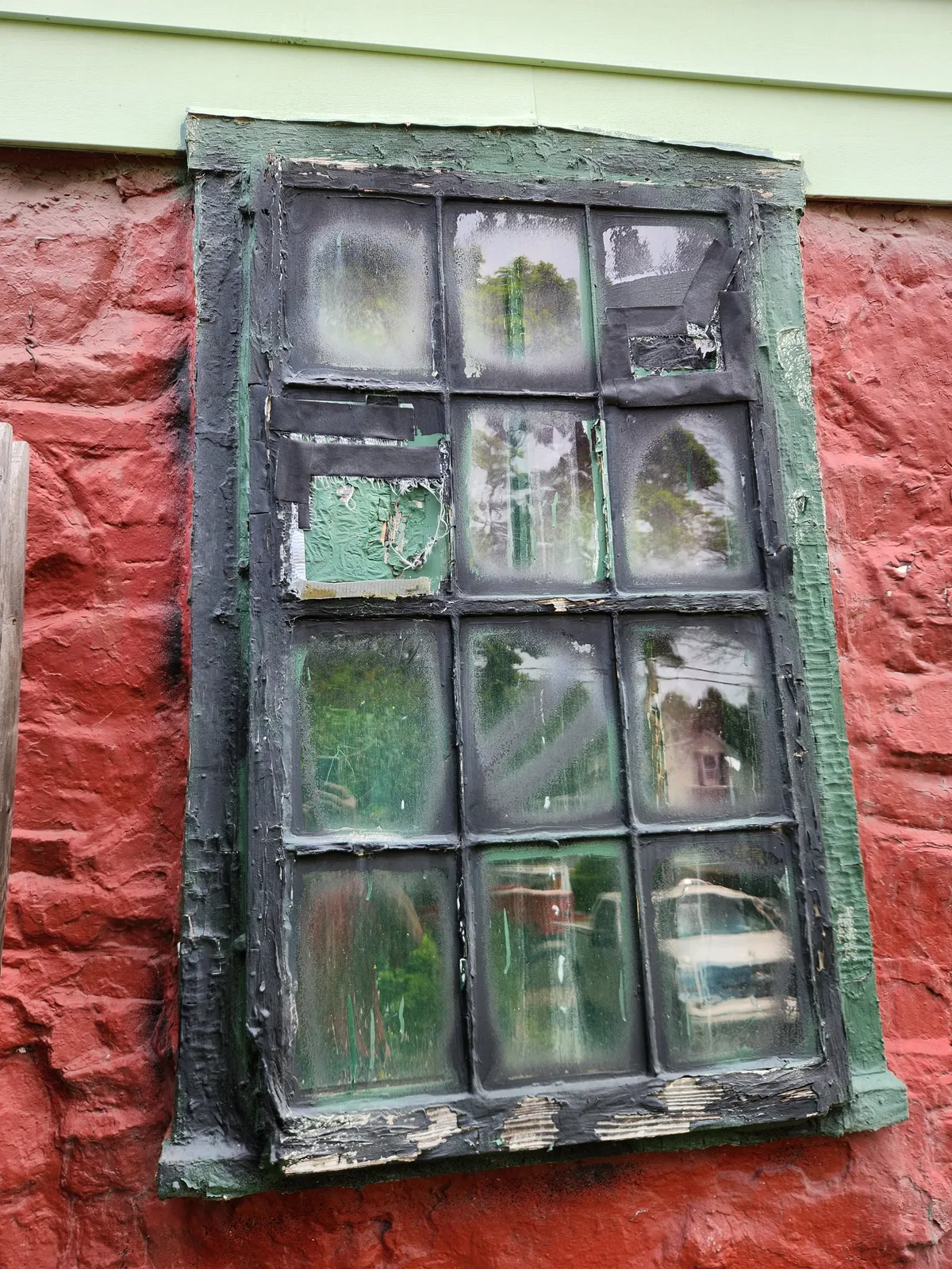 Original deteriorated sash window before replacement