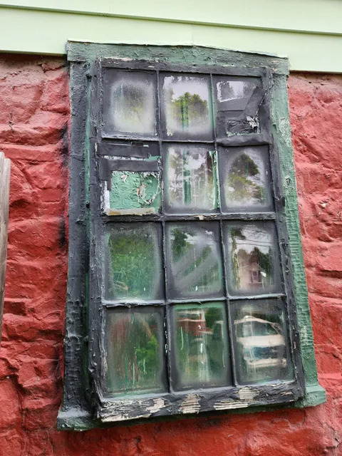 Original deteriorated sash window before replacement