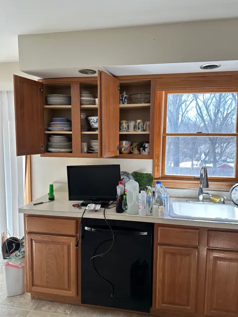 Kitchen with clutter before cleanout