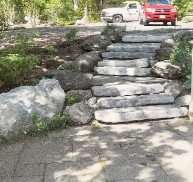 Native stone steps and thermal treated Bluestone patio