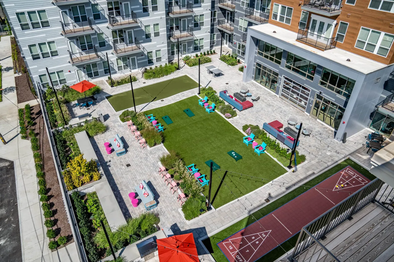 The 3rd floor central courtyard, built by Dex by Terra, at V2 Apartments in Chelsea, Massachusetts. Landscape & hardscape installation.