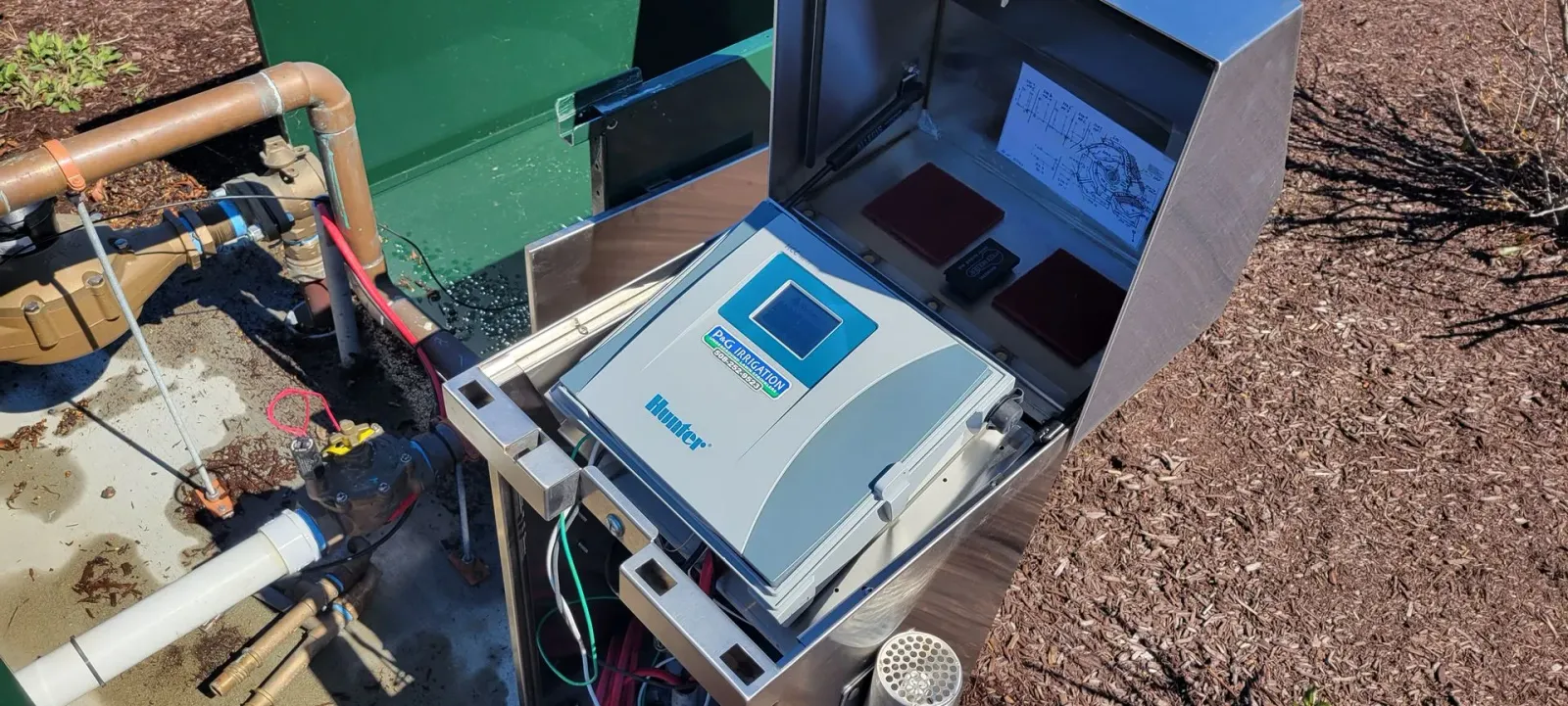 A stainless steel box with a computer inside of it.