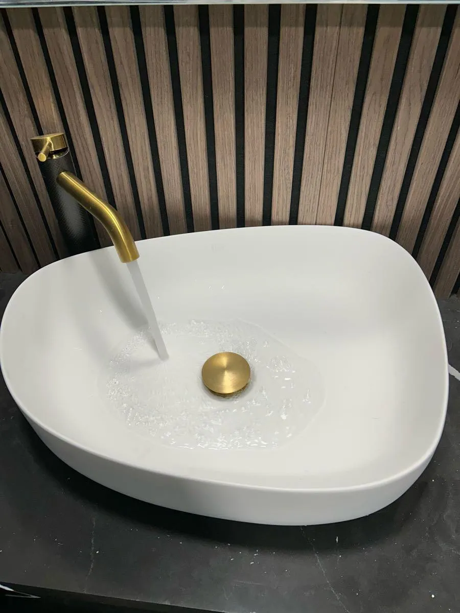 Finished vessel sink and faucet installation