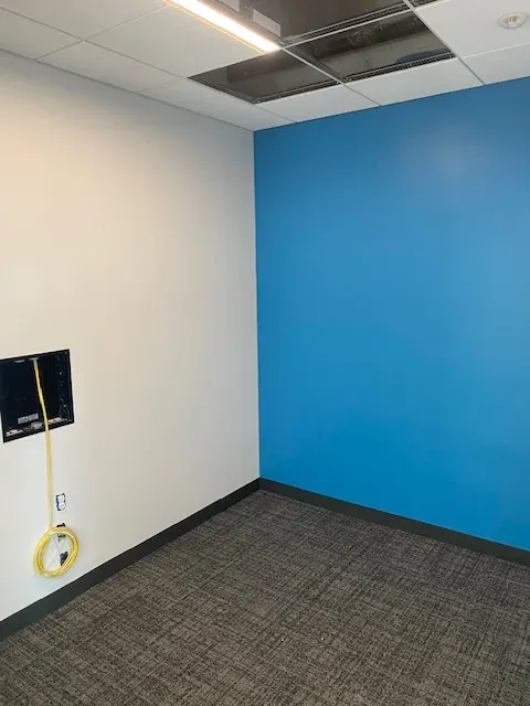 Commercial blue accent wall in progress