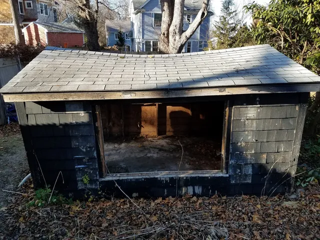 Existing outbuilding before rebuild