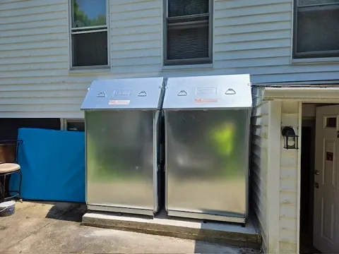 Tanks Outside of House