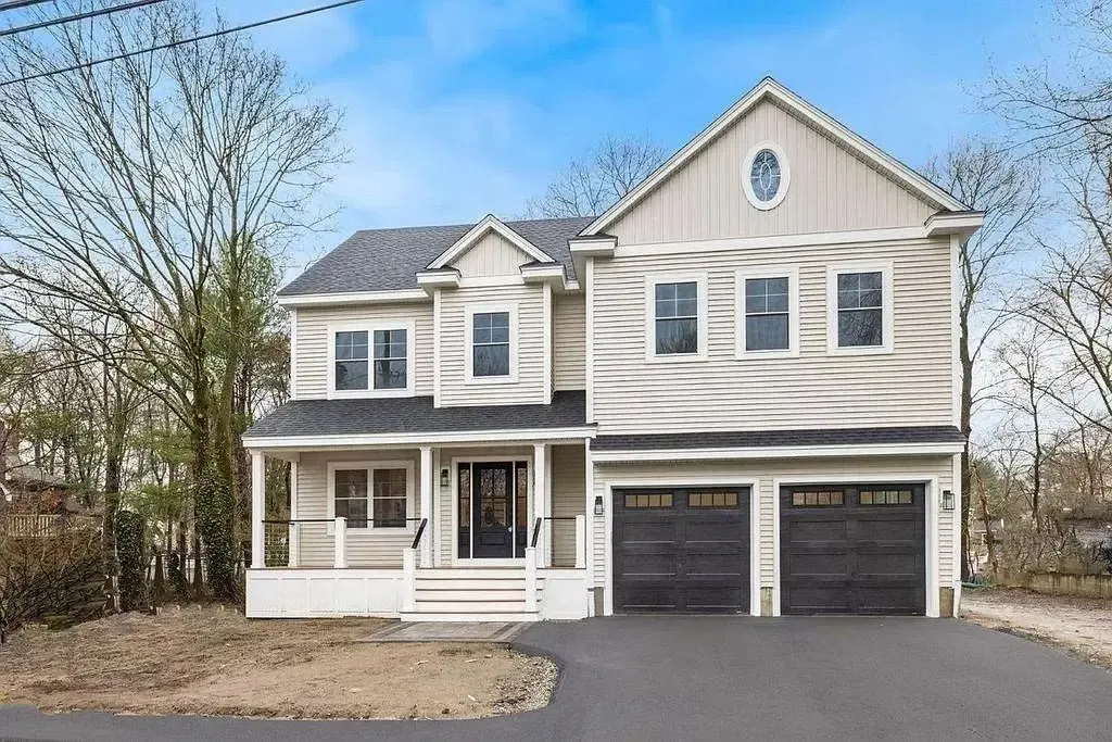 New construction of craftsman home with 2 car garage and a front porch