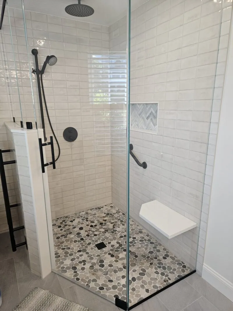 Larger custom tiled shower after floorplan flip in Plymouth MA
