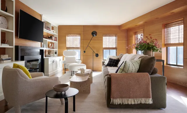 A living room filled with furniture and a flat screen tv