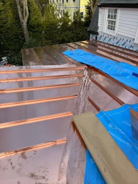 Copper roof installation in progress