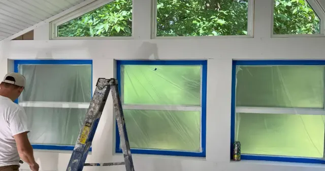 Exterior window trim masked for prep