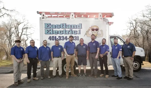The Eastland Electric team standing in front of their company box truck