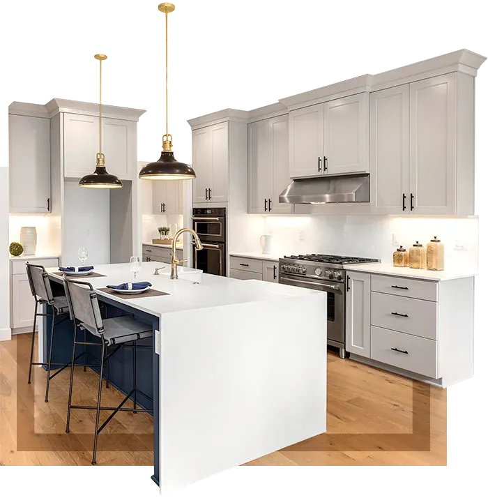 Luxury custom kitchen cabinetry design featuring white shaker cabinets and a navy blue island in Nashua, NH.