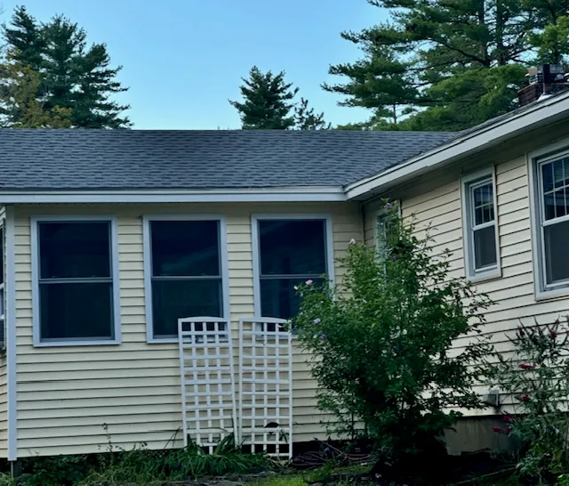 Completed roof repair area at an Amherst home after a leak into the kitchen