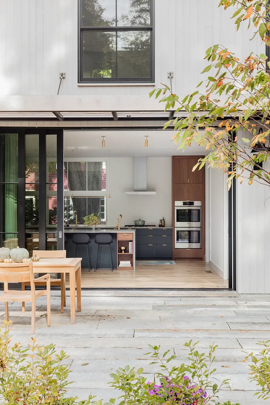 Timber-framed barn conversion with glass doors