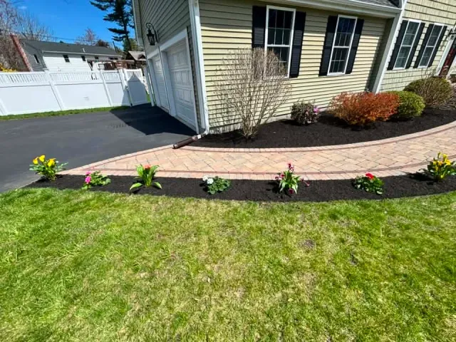 Paver Patio with Curved Brick Walkway